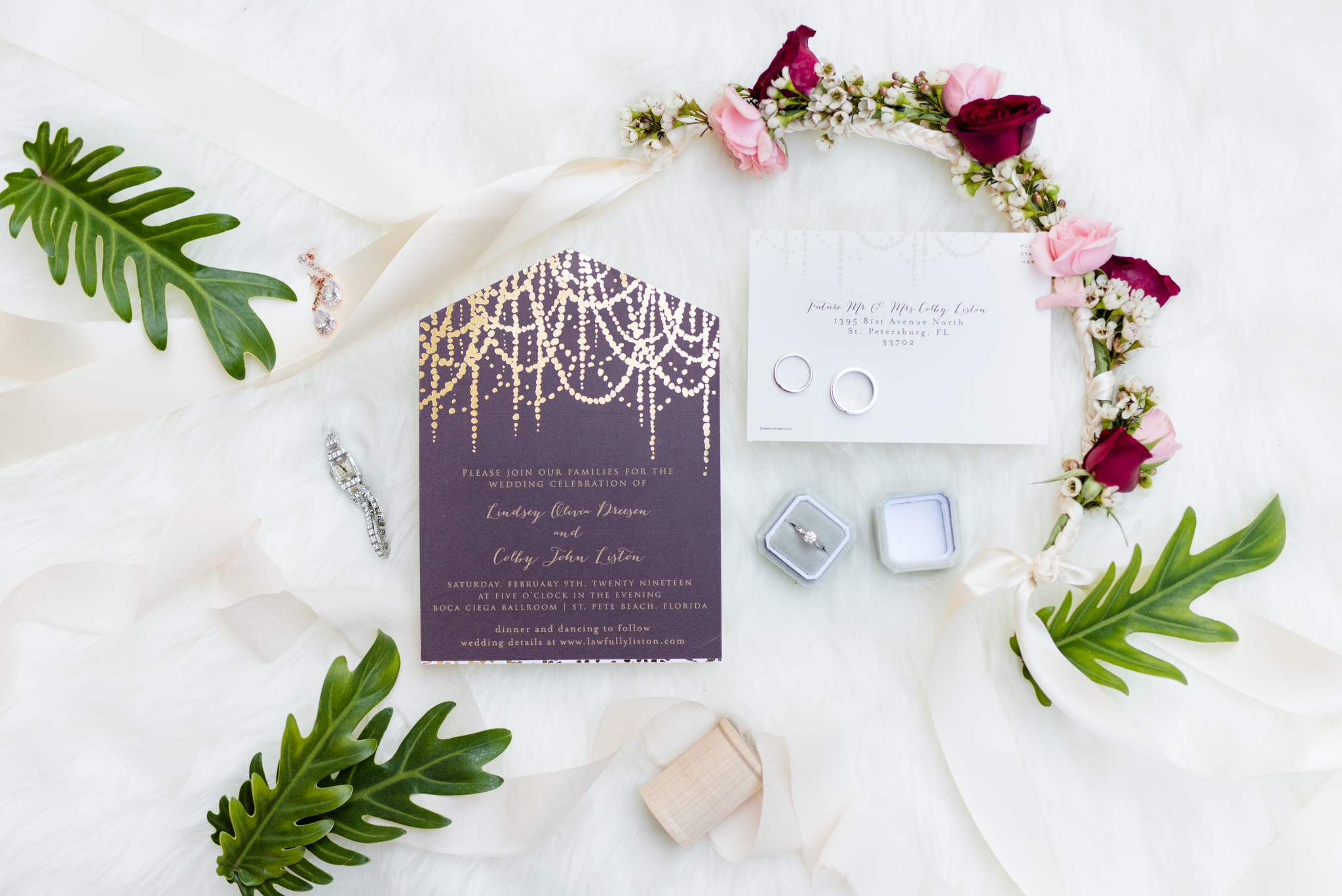 Wedding invitation and florals.