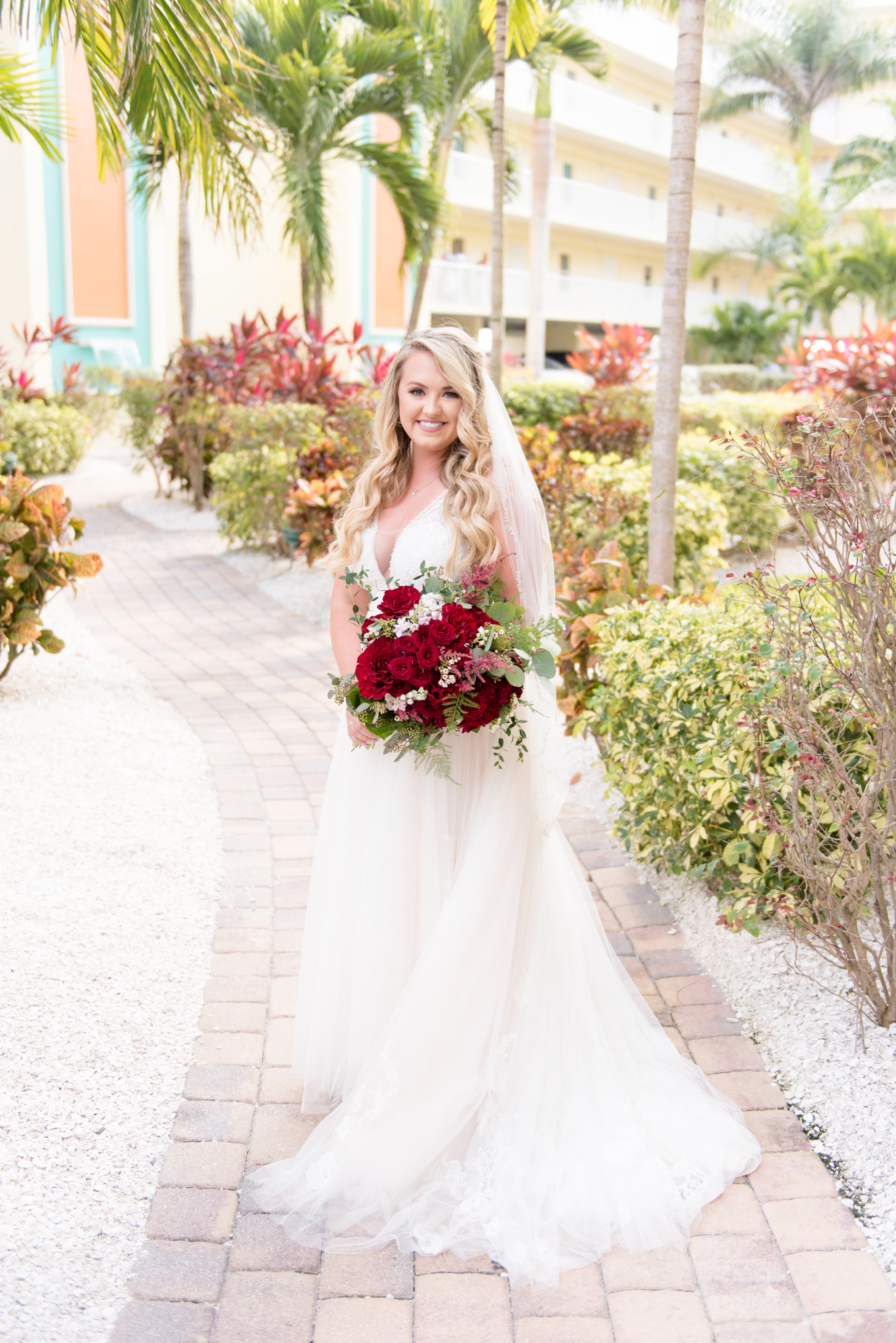 Bride smiles at camera.