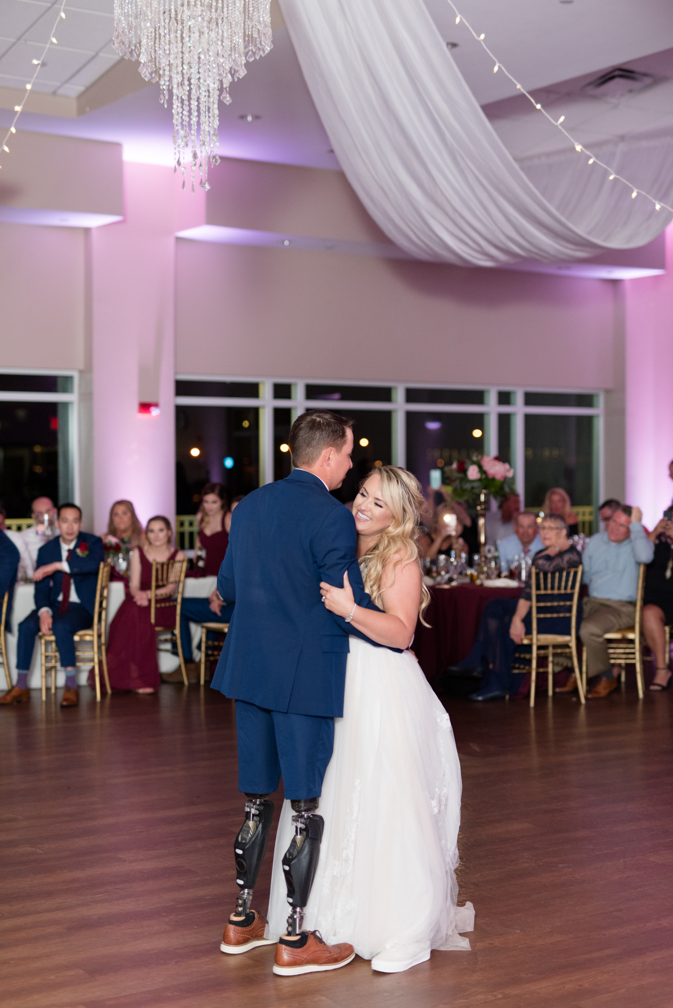 Bride and groom dance at reception.