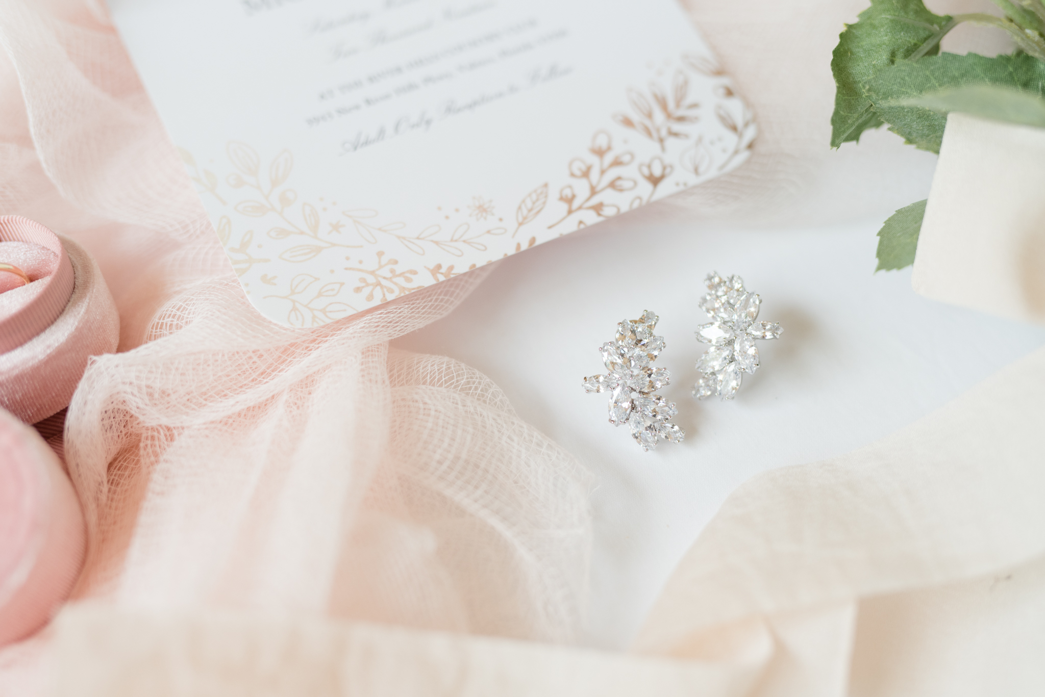 Close up of bridal earrings.