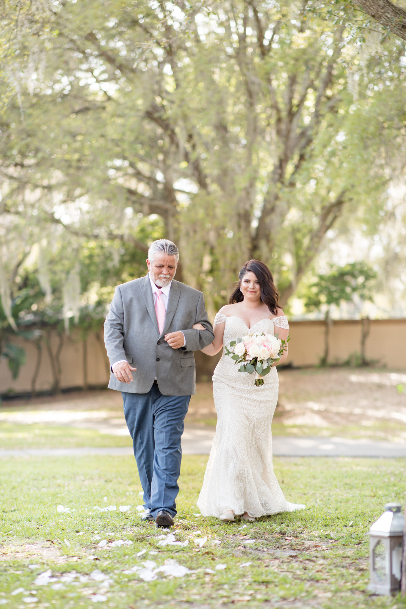 Bride walks down aisle. 