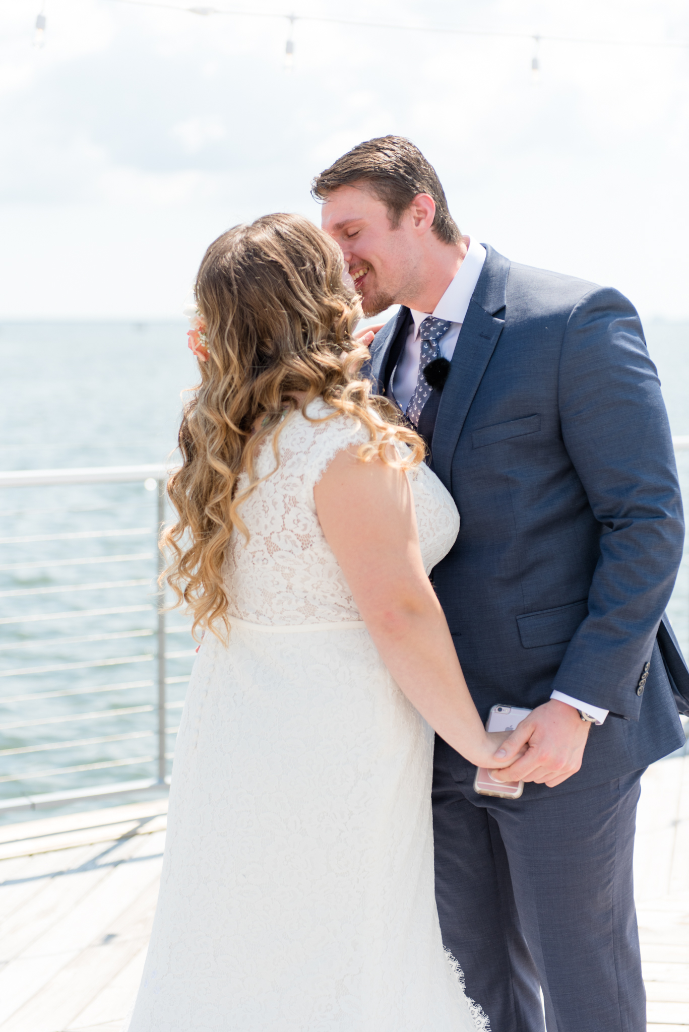 Bride and groom kiss during first look.