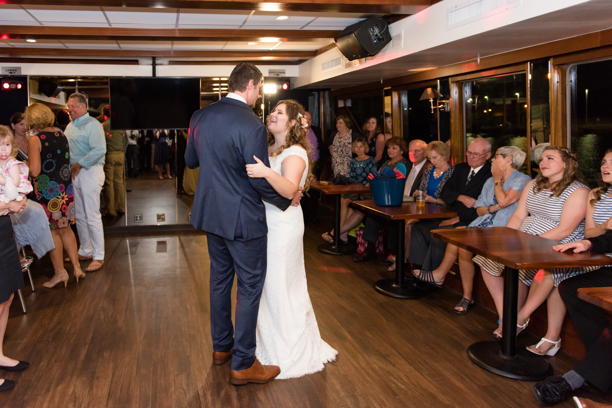 Bride and groom dance.