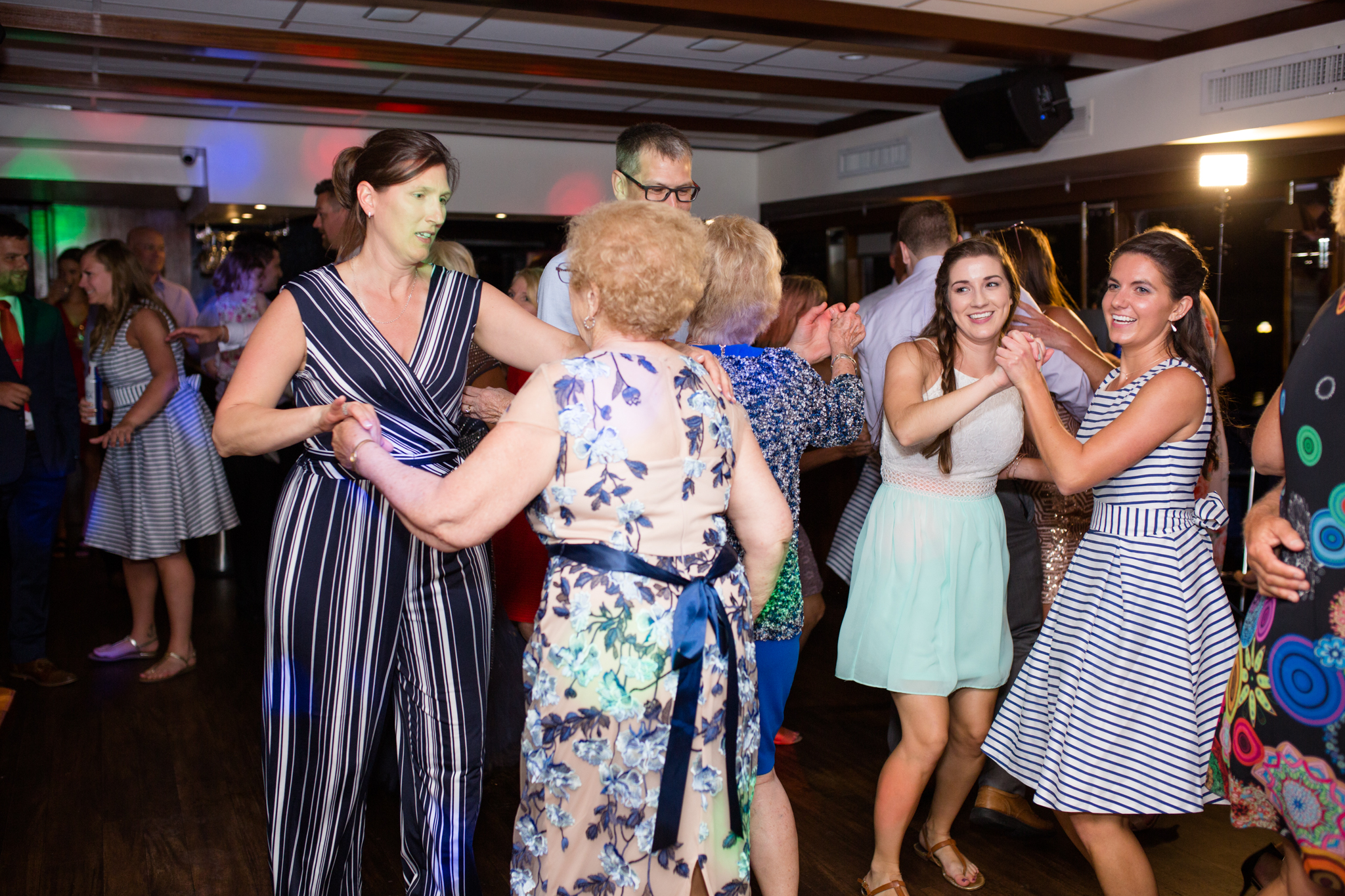 Guests dance during reception.