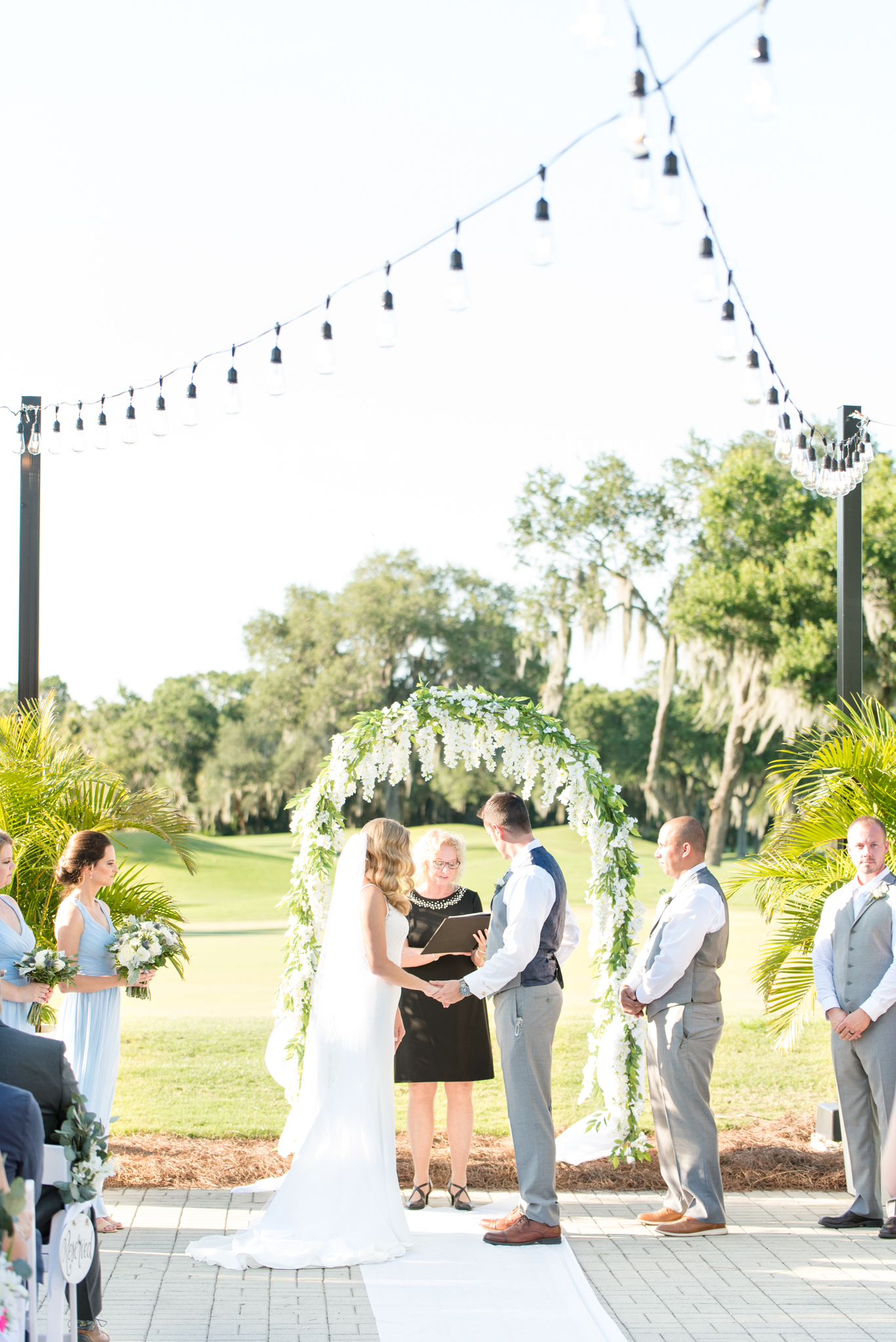 Bride at groom get married at Rosedale Gold and Country Club wedding