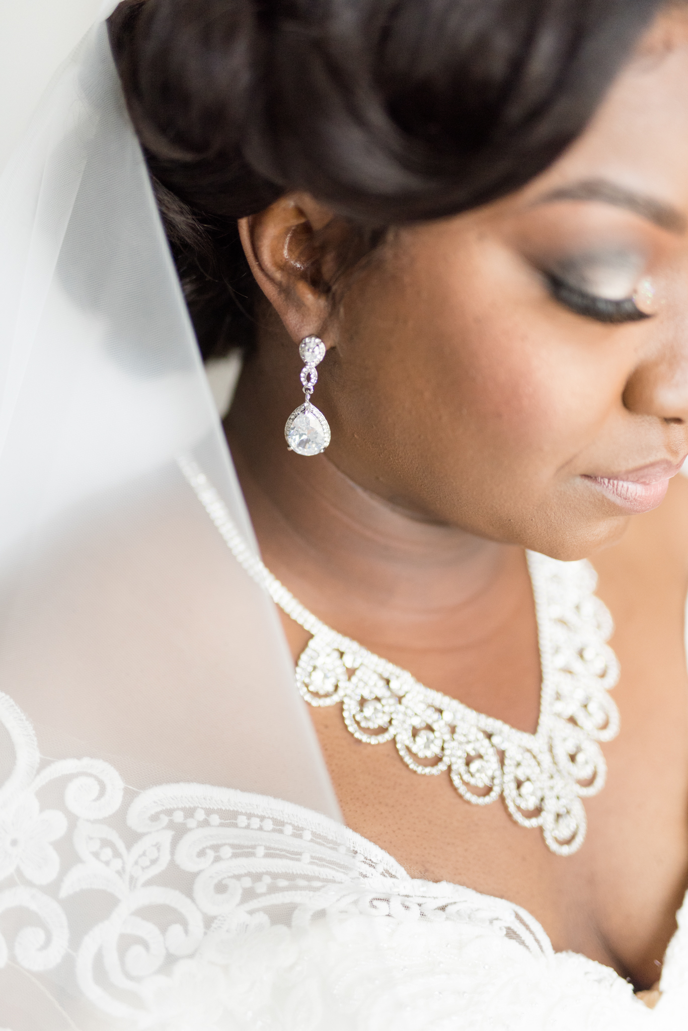 Closeup of bridal earrings.