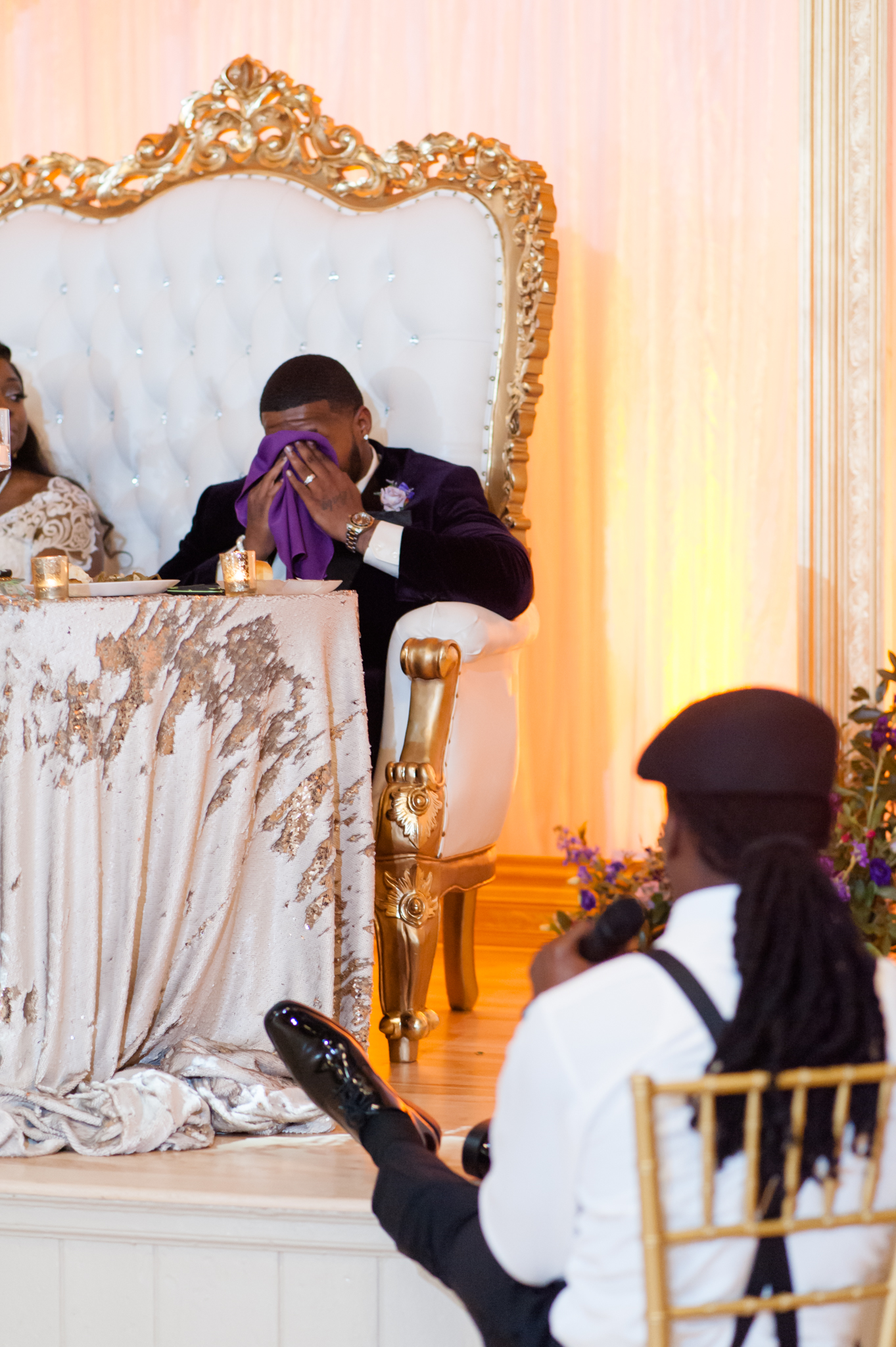 Best man gives speech while groom cries.