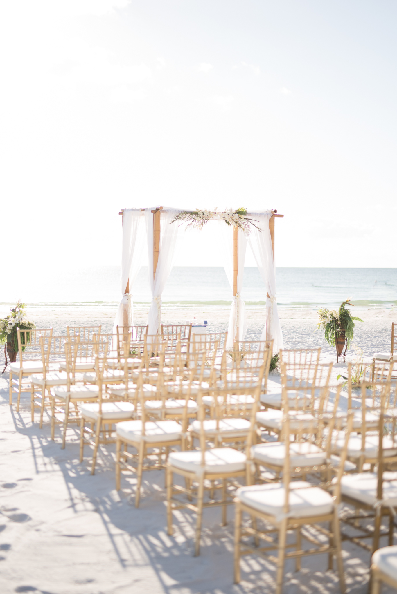 Ceremony site with empty chairs.
