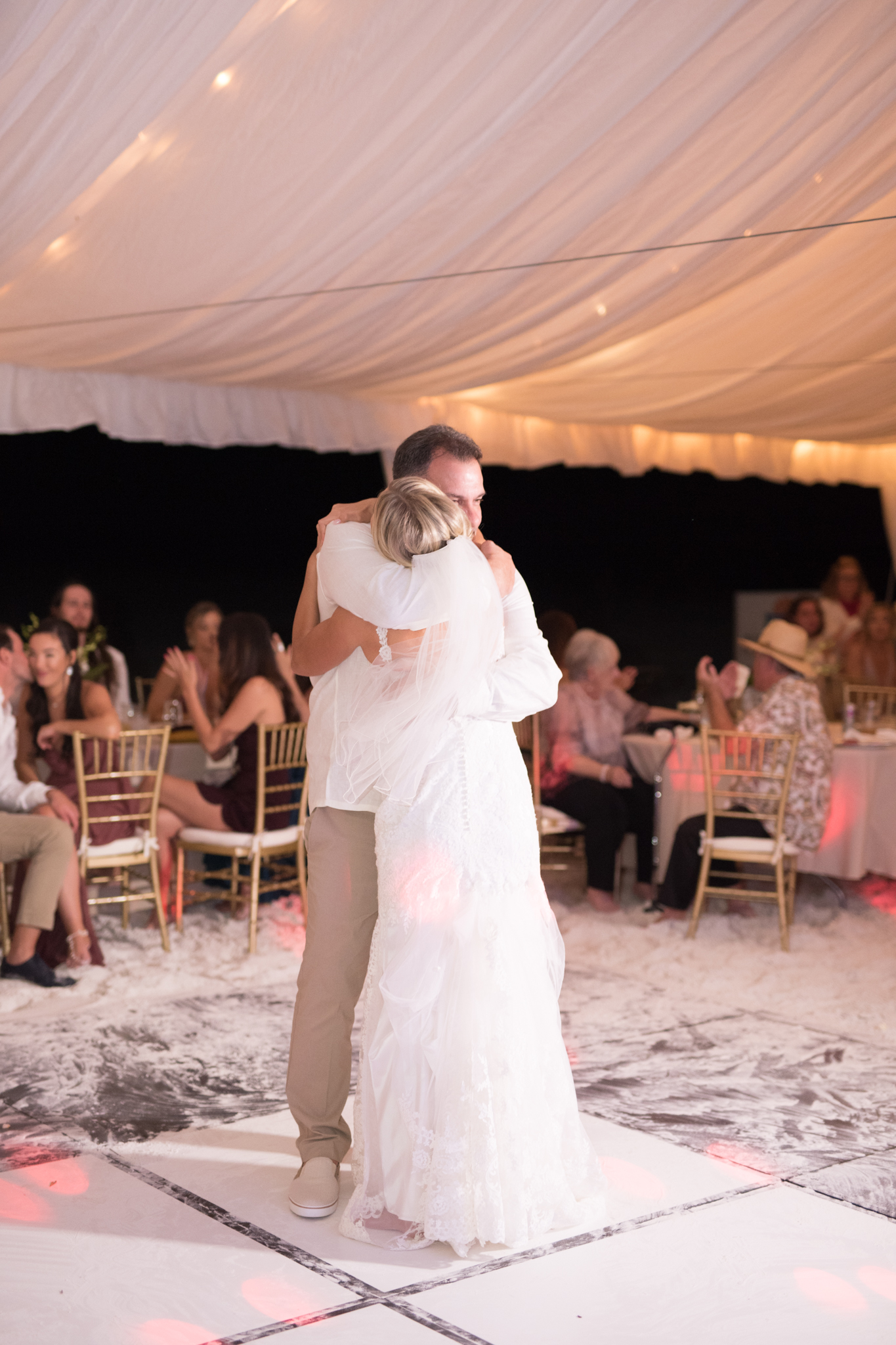 Bride and father share a dance.