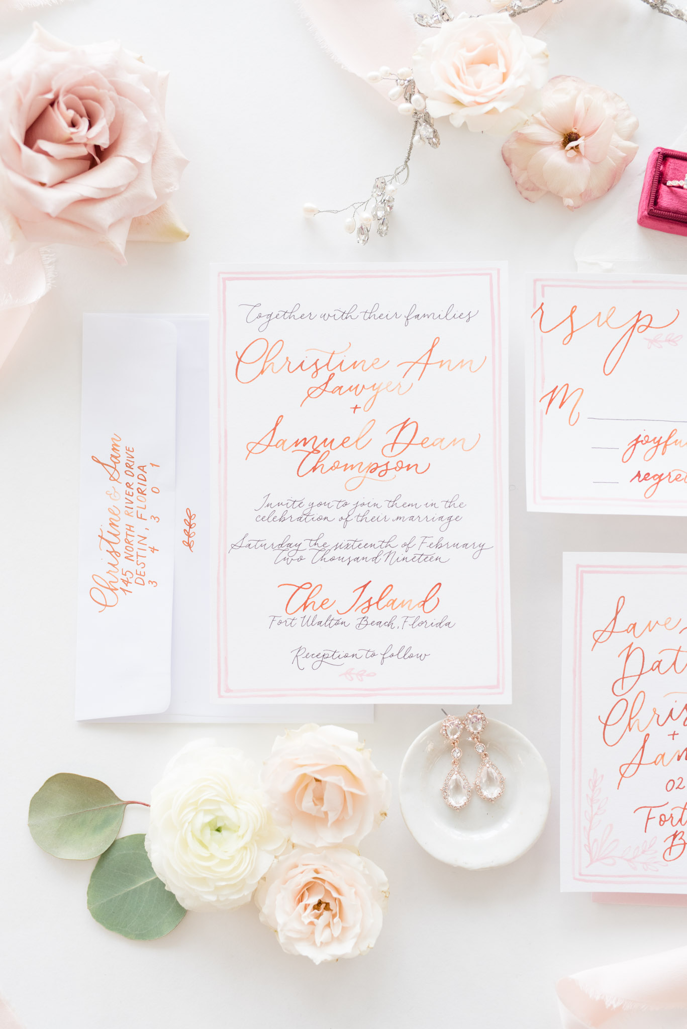 Pink and white wedding invitations.