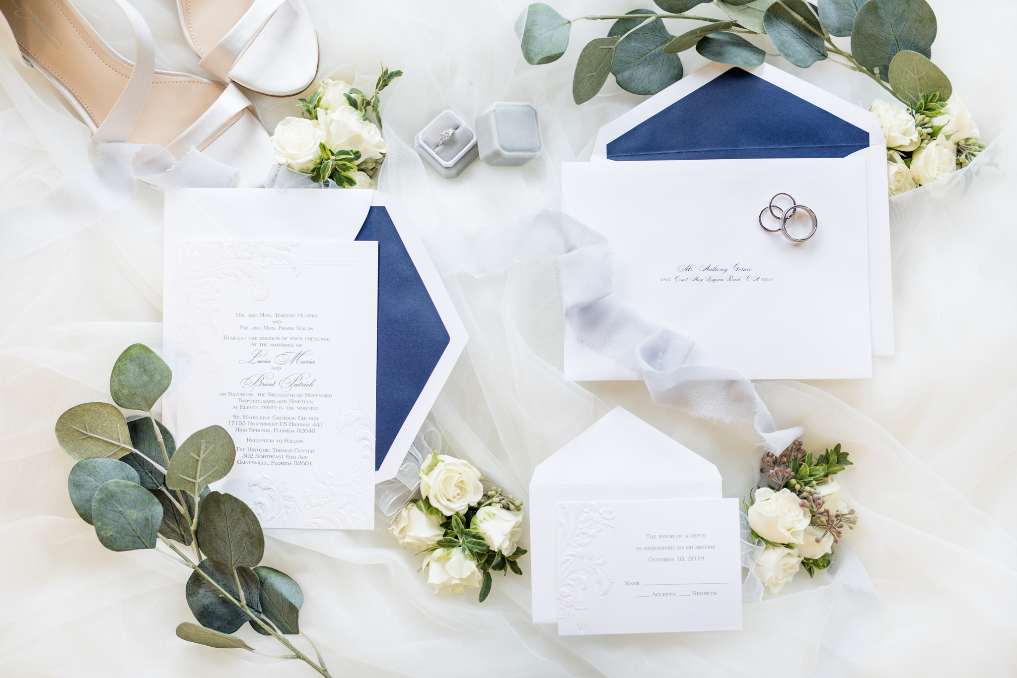 Wedding invitations and ribbon.