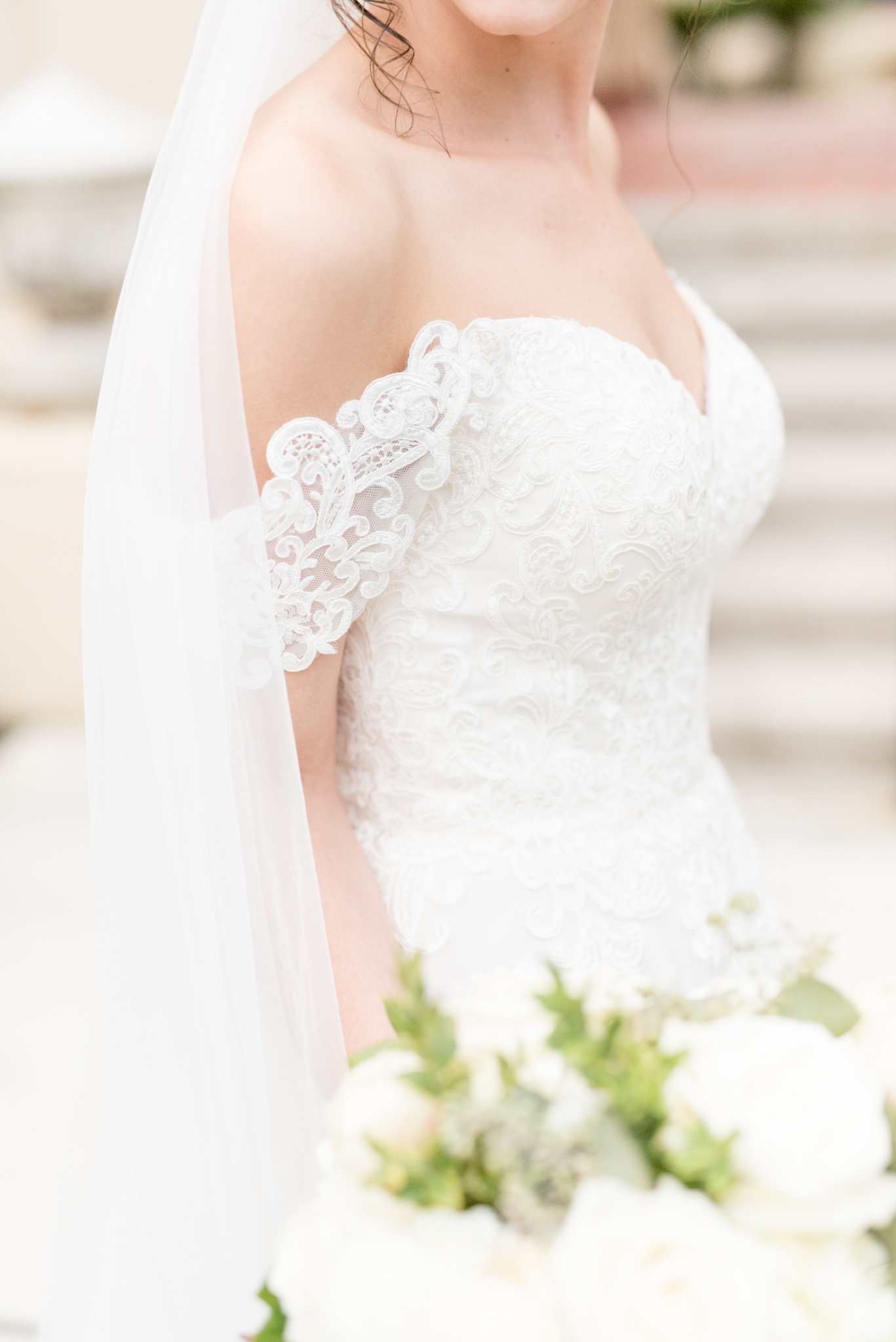 Bride's wedding grown lace details.