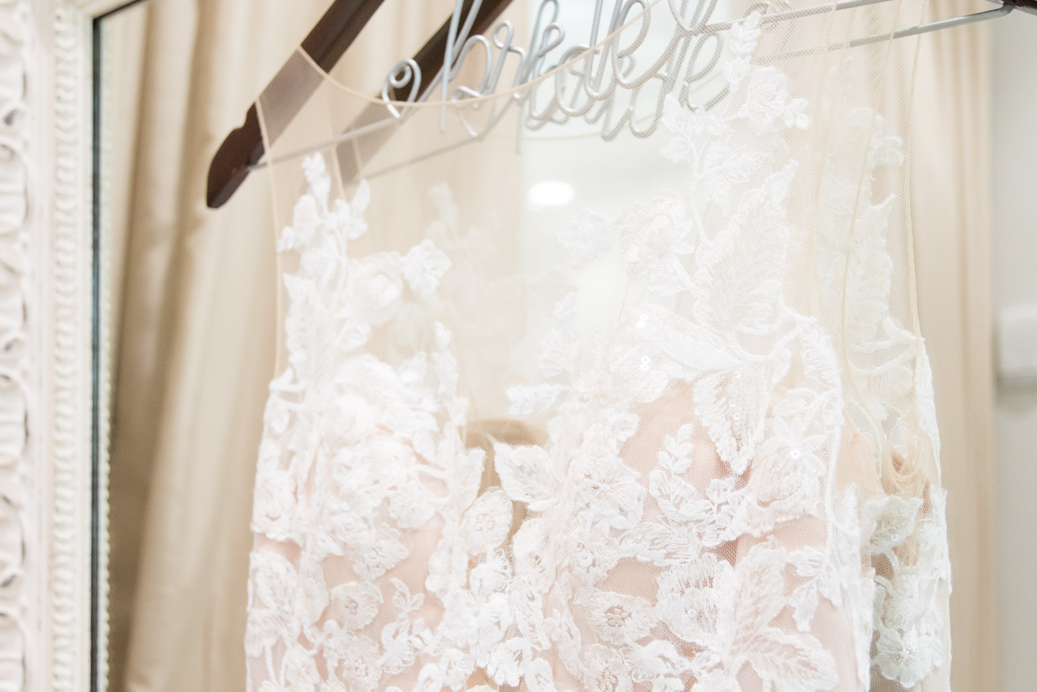 Closeup of bride's wedding dress.