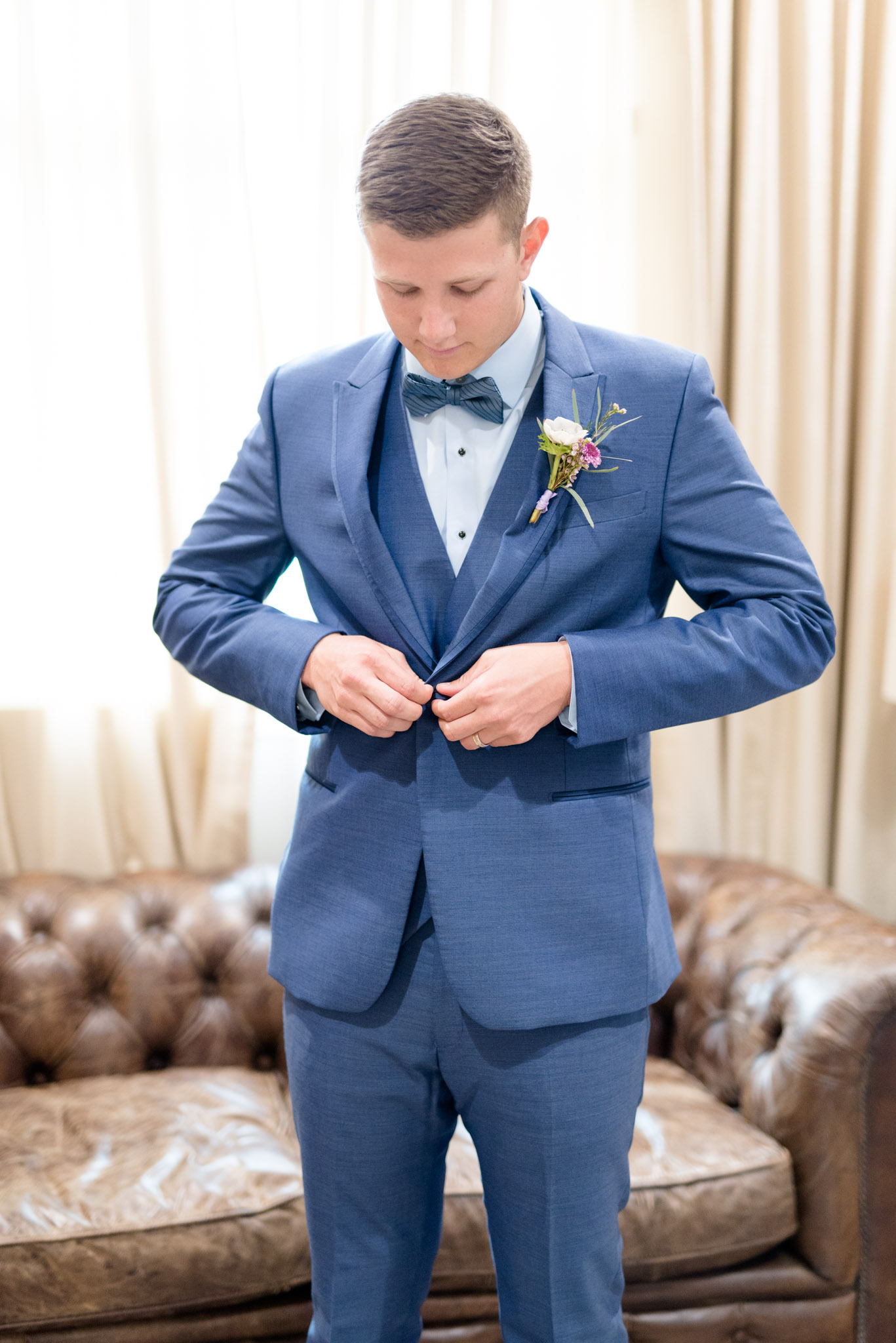 Groom buttons jacket.