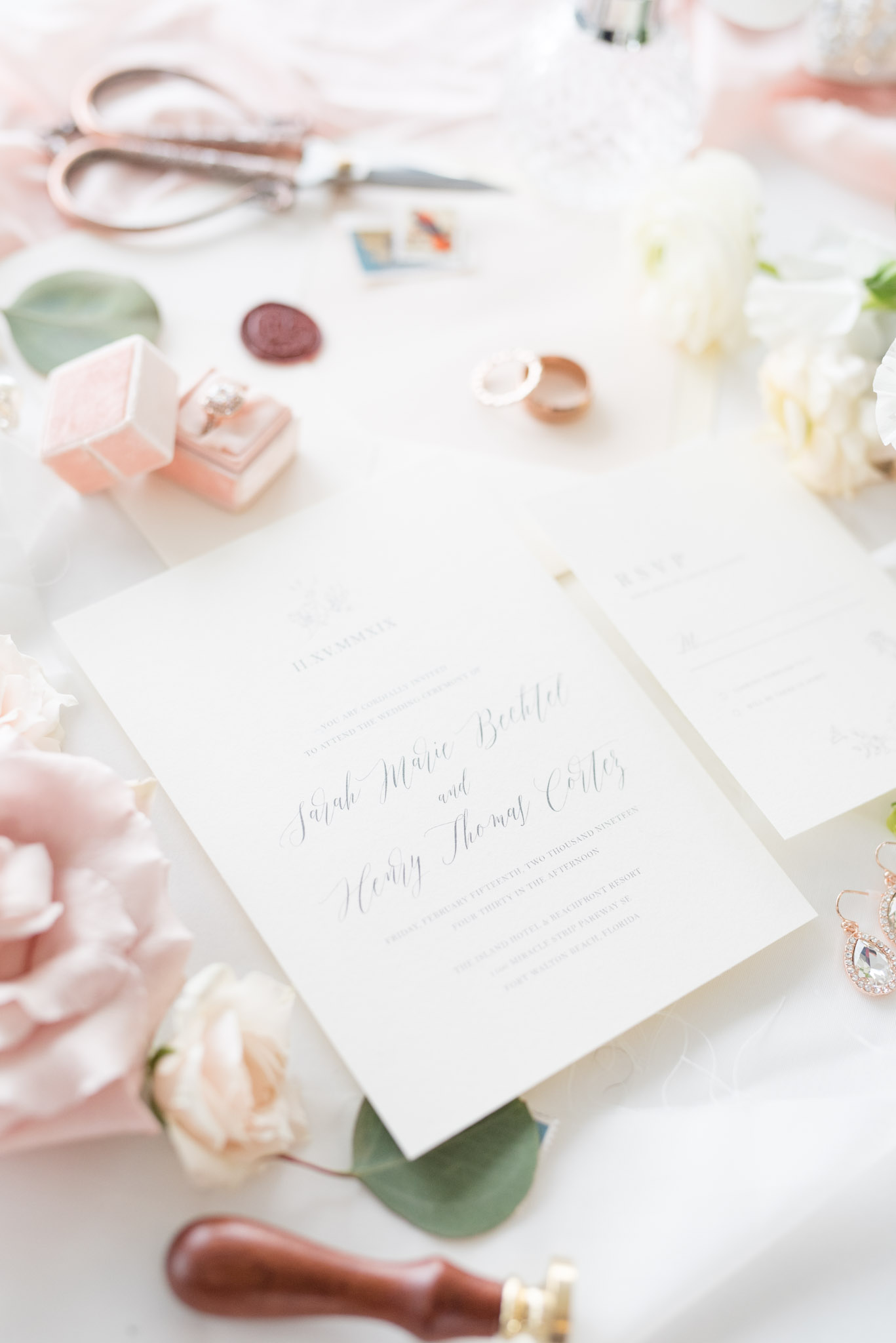 Wedding invitations with other bridal details.