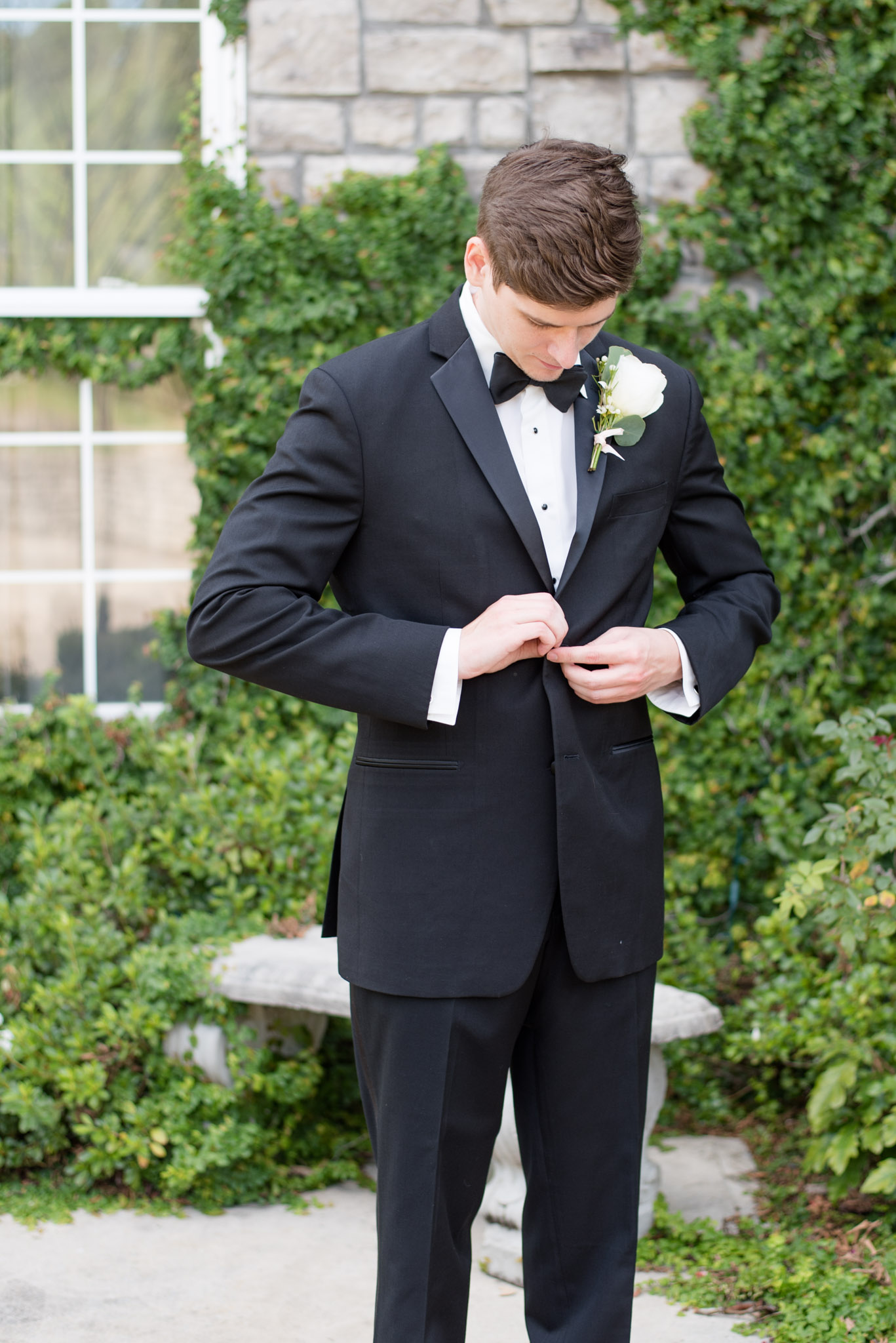 Groom buttons tux jacket.