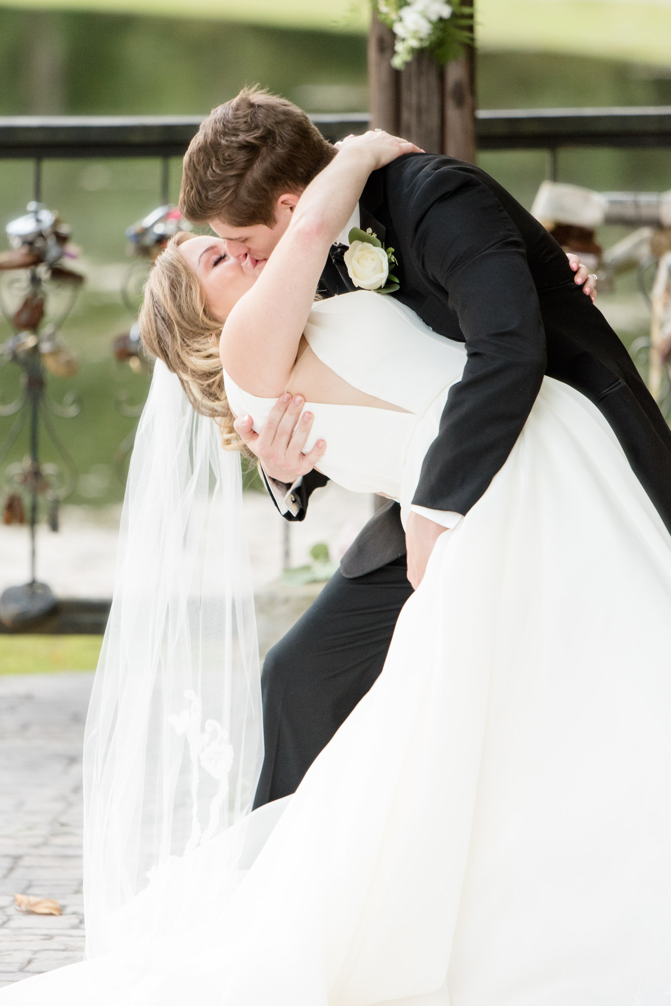couple kisses at wedding ceremony.