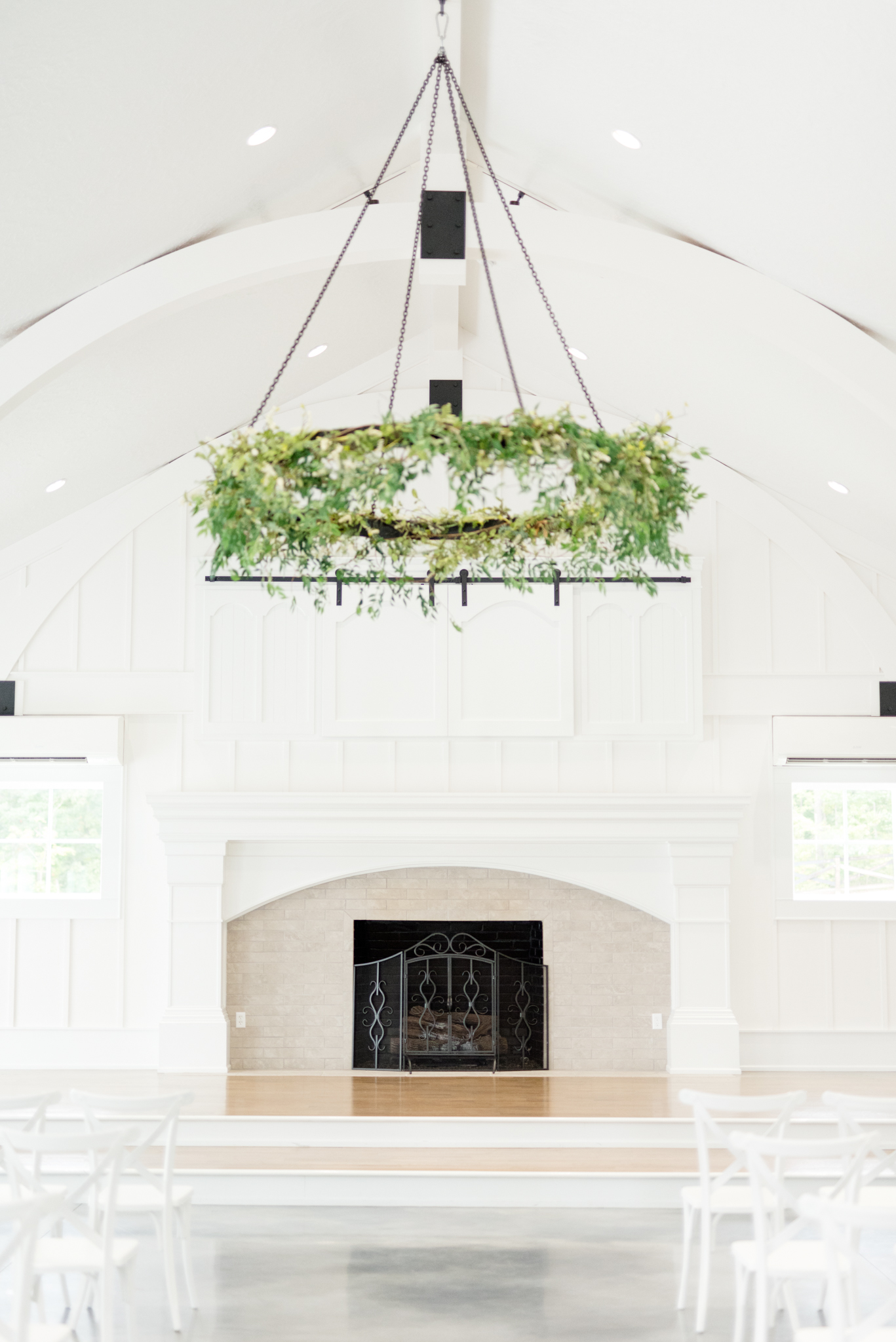 Fireplace centerpiece at wedding ceremony.