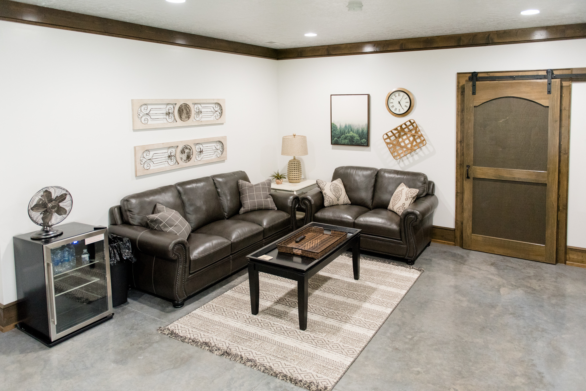 Groom's suite with comfy couches.