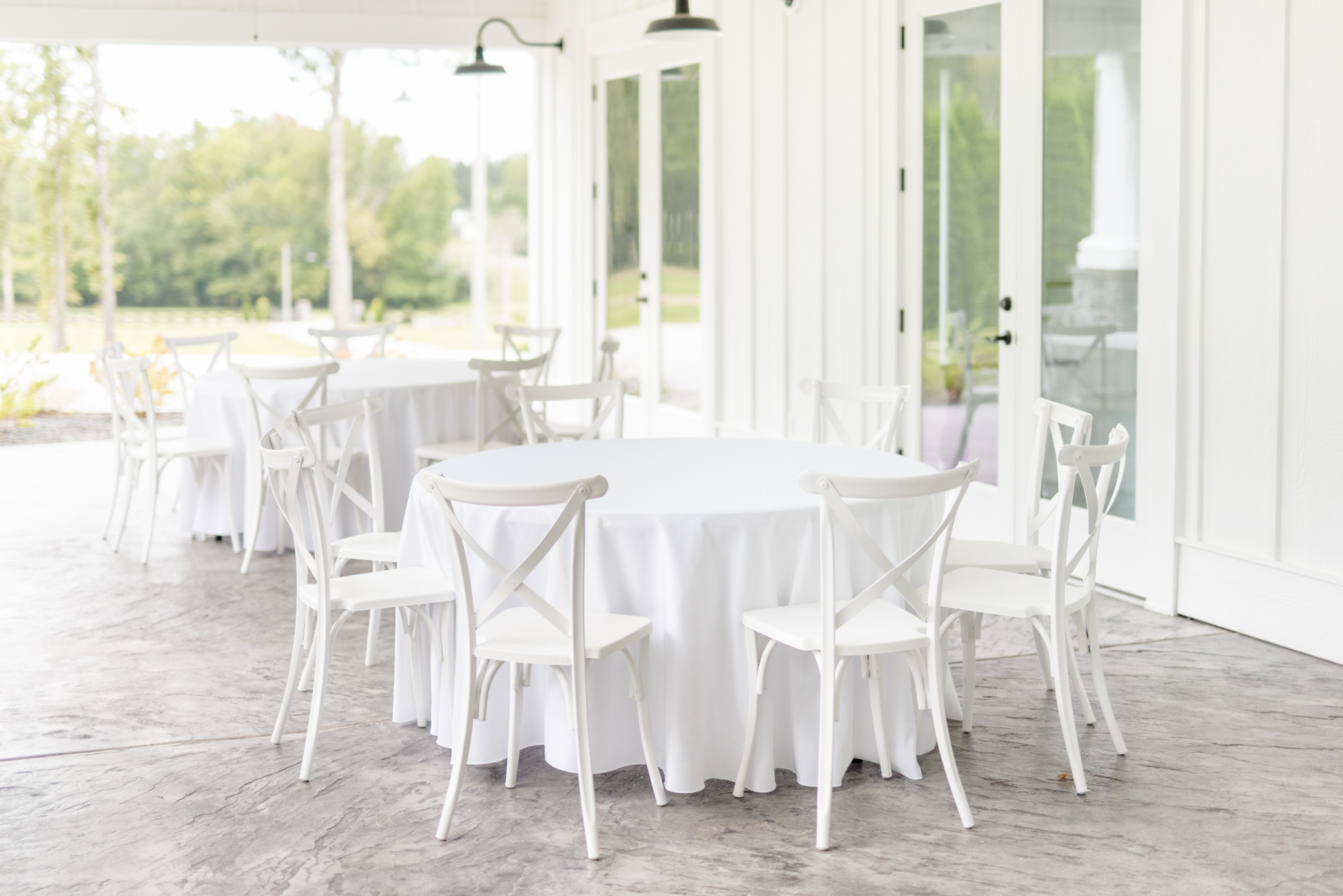 White table and chairs in reception area.