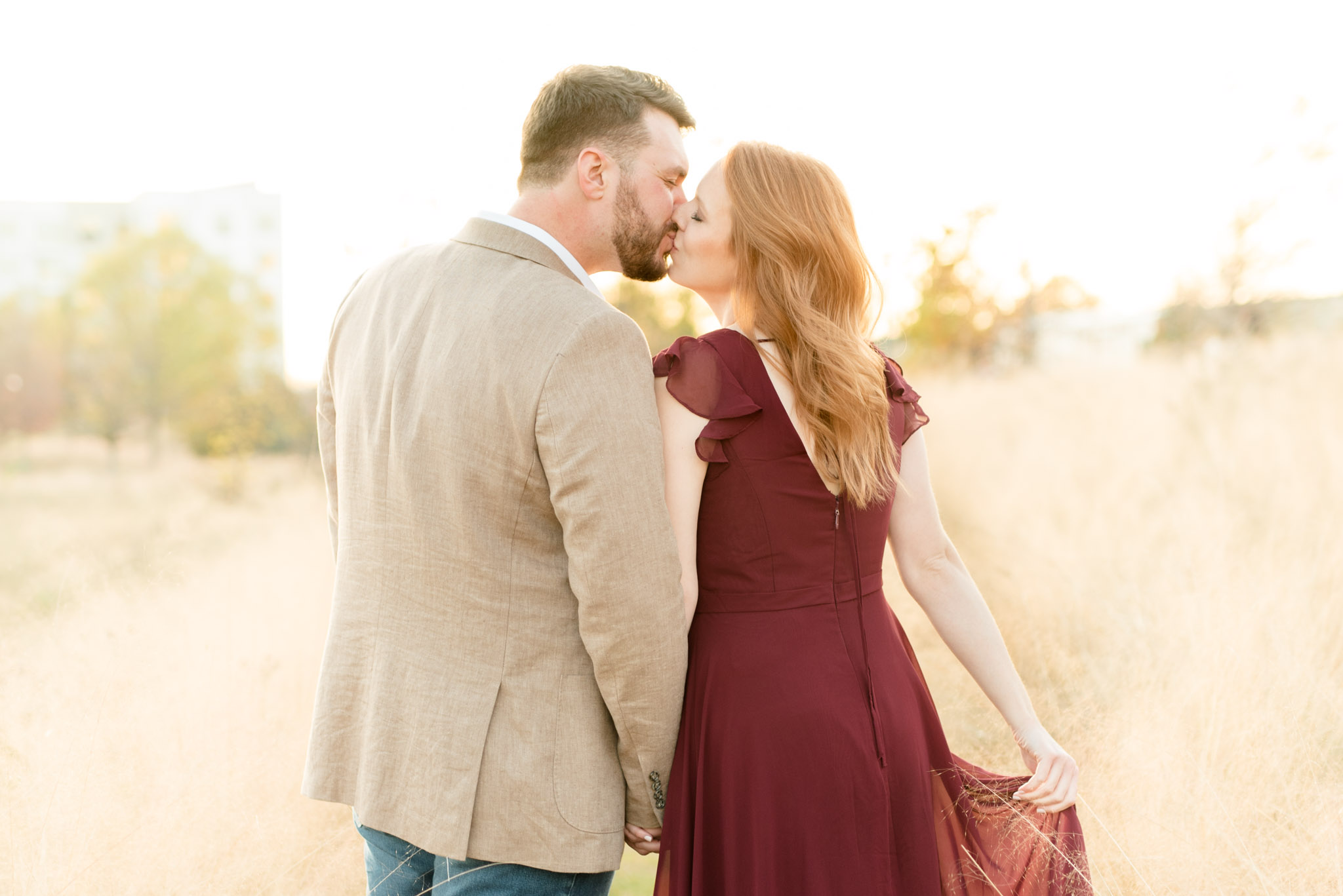 Married couple kiss in railroad park anniversary session