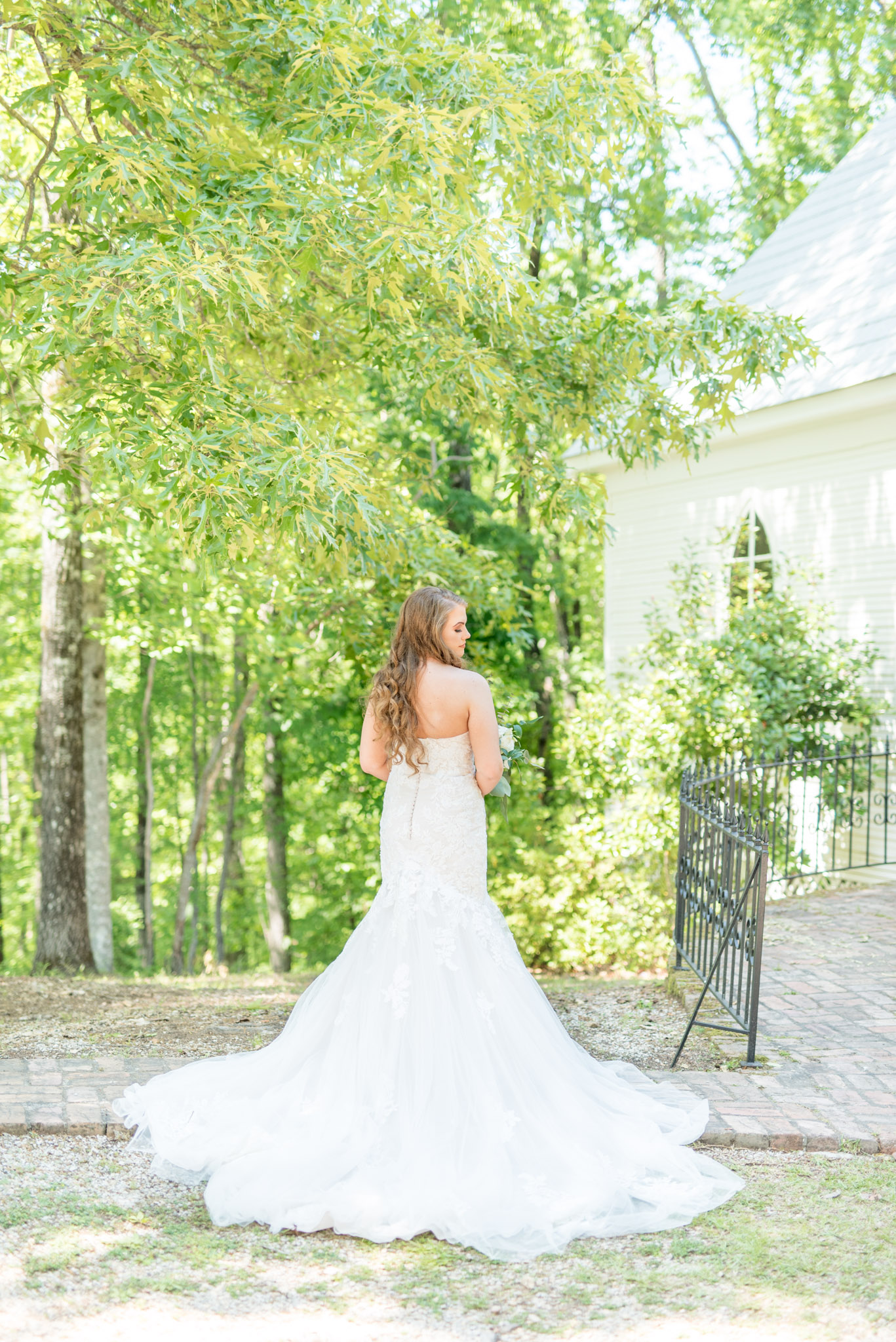 Bride show off back of dress.