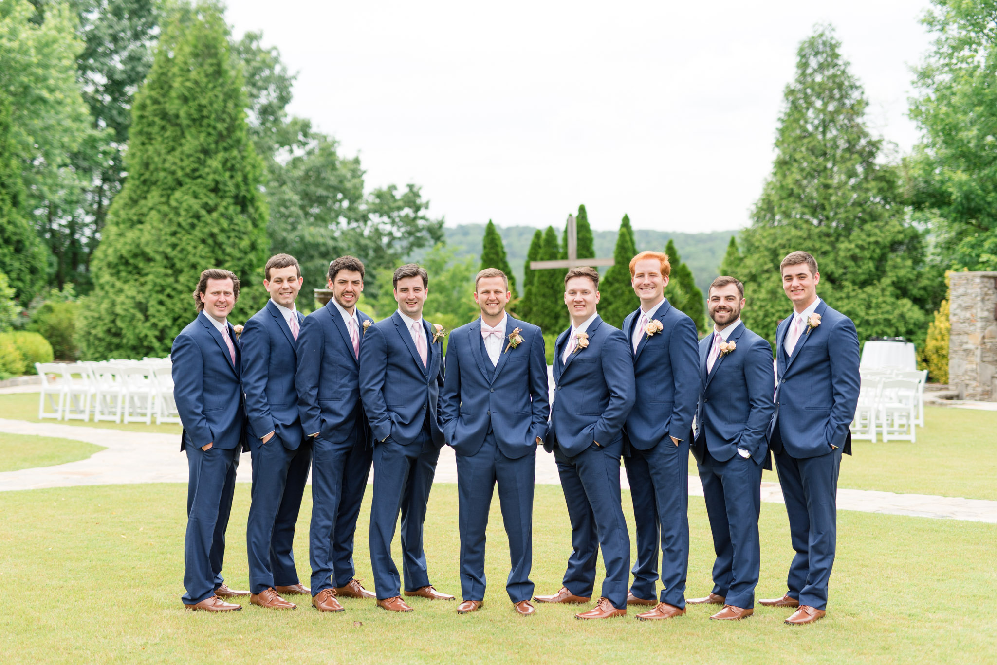 Groom and groomsmen smile at Park Crest Event Facility.