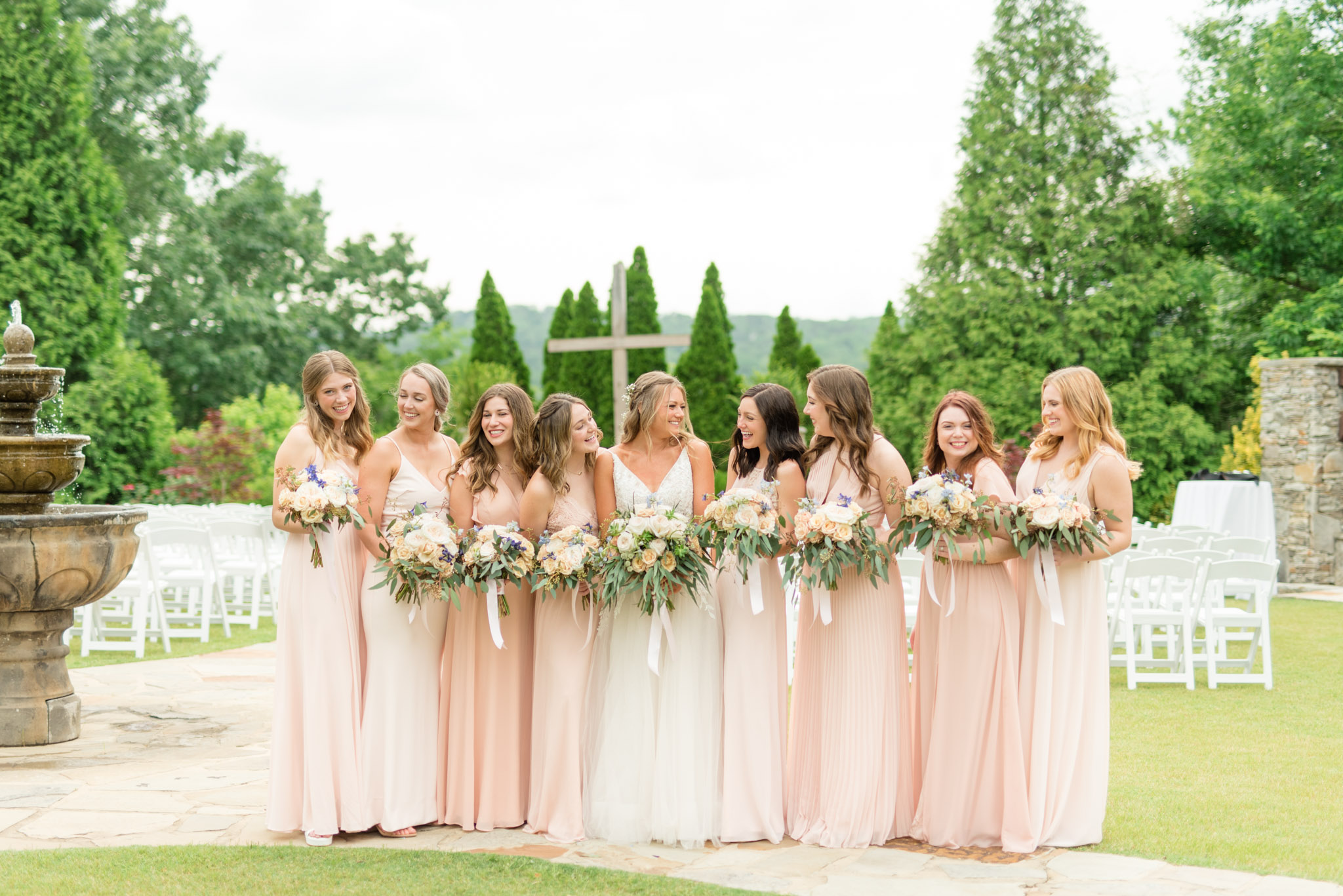 Bridal party laughs at Park Crest Event Facility.