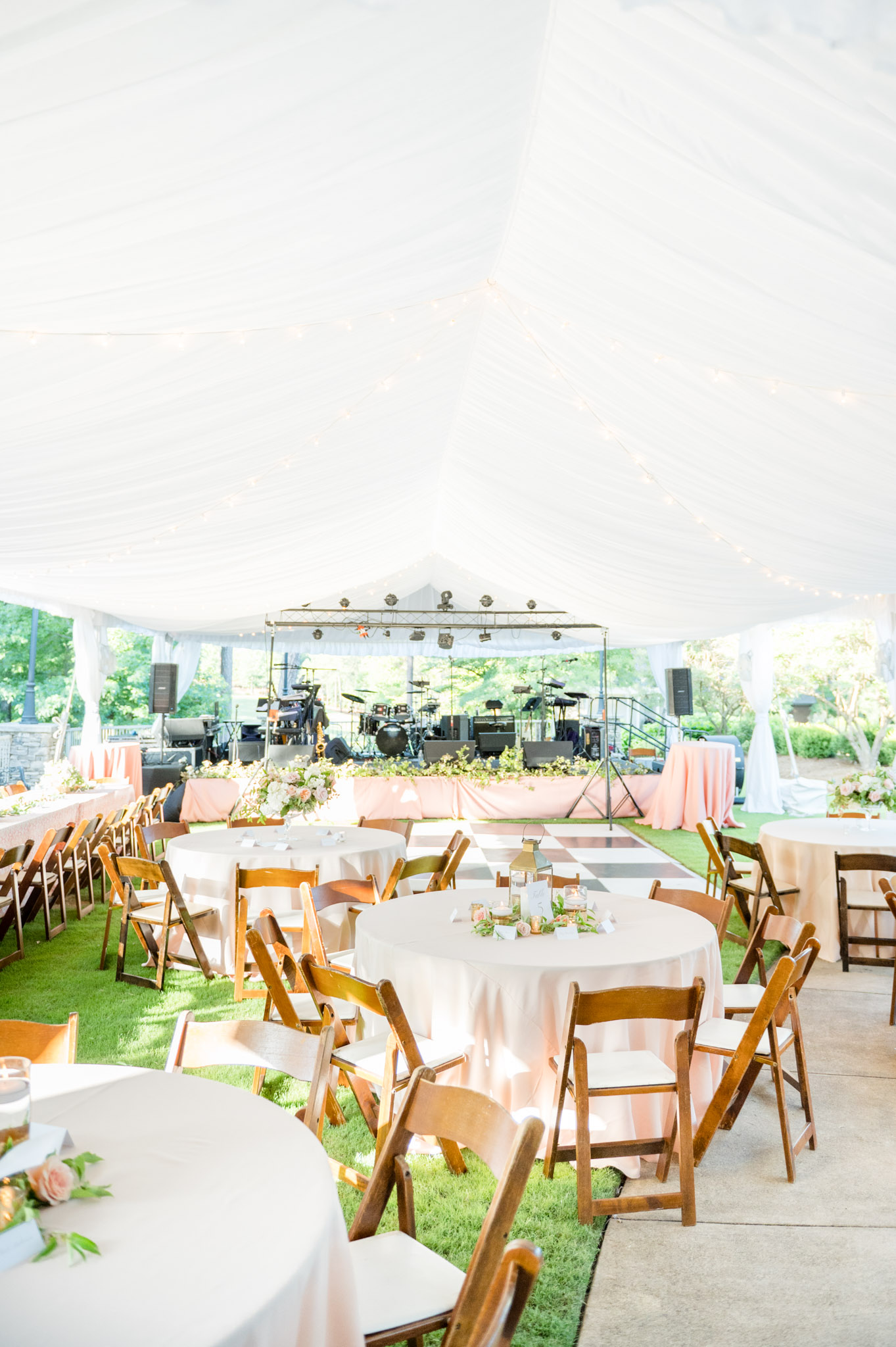 White and blush reception tent.