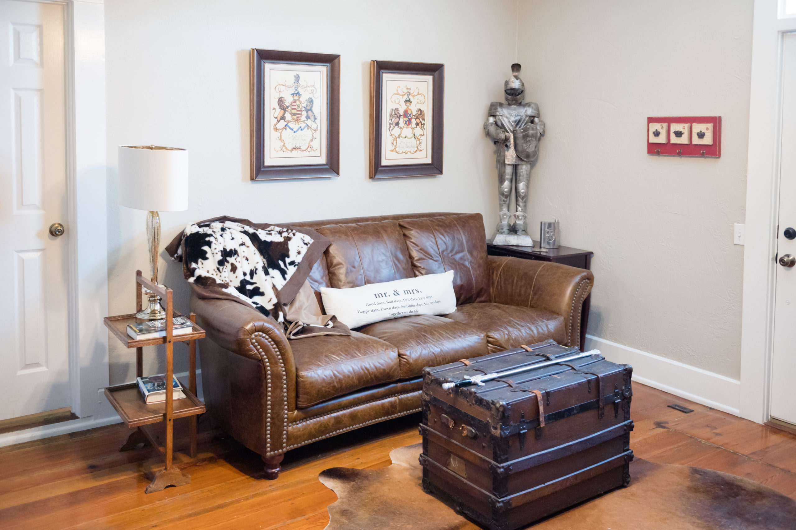 Leather couch in groom's getting ready space.