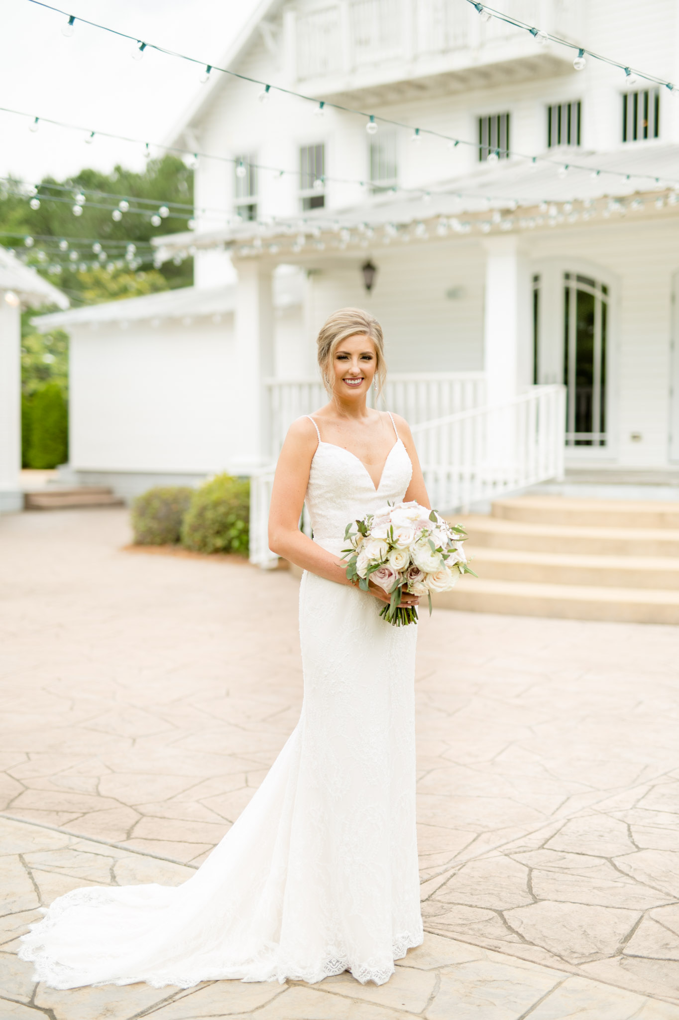 Bride smiles at camera at The Sonnet House.