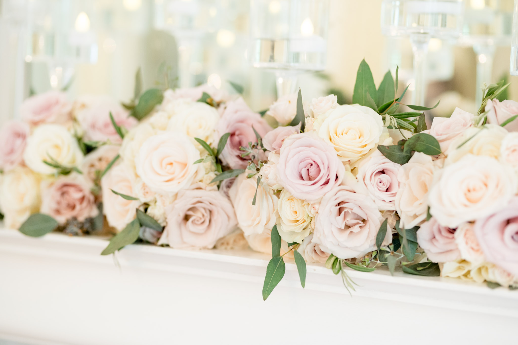 White and pink flowers displayed at reception.