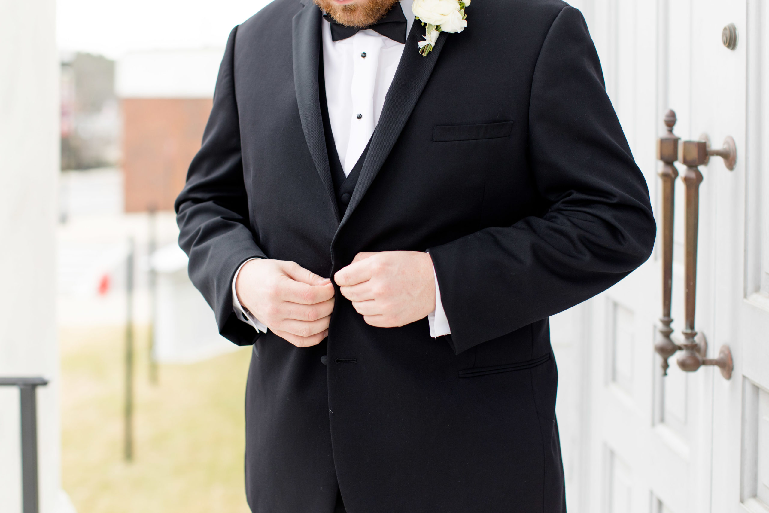 Groom buttons jacket.