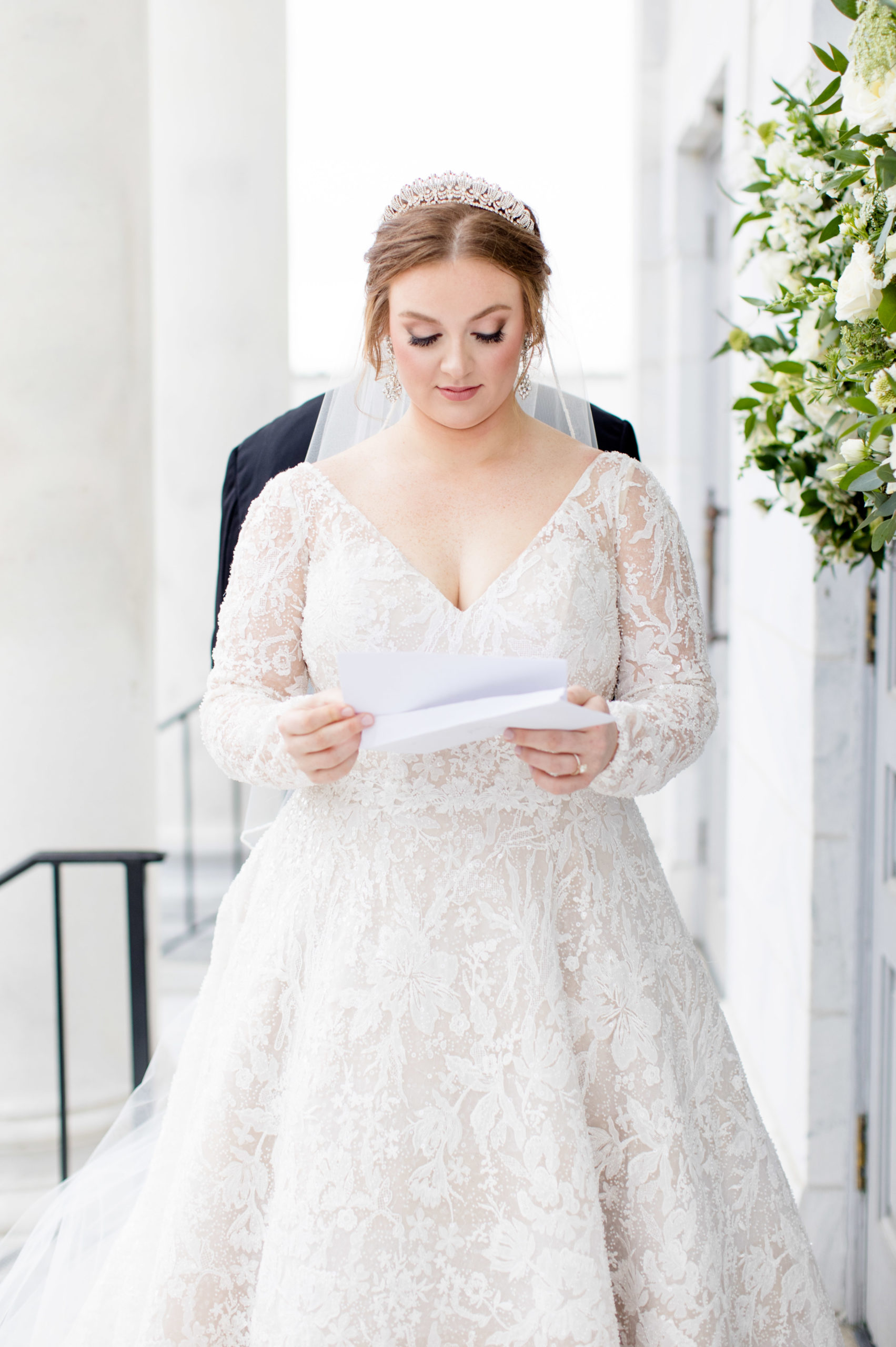 Bride reads letter from groom.