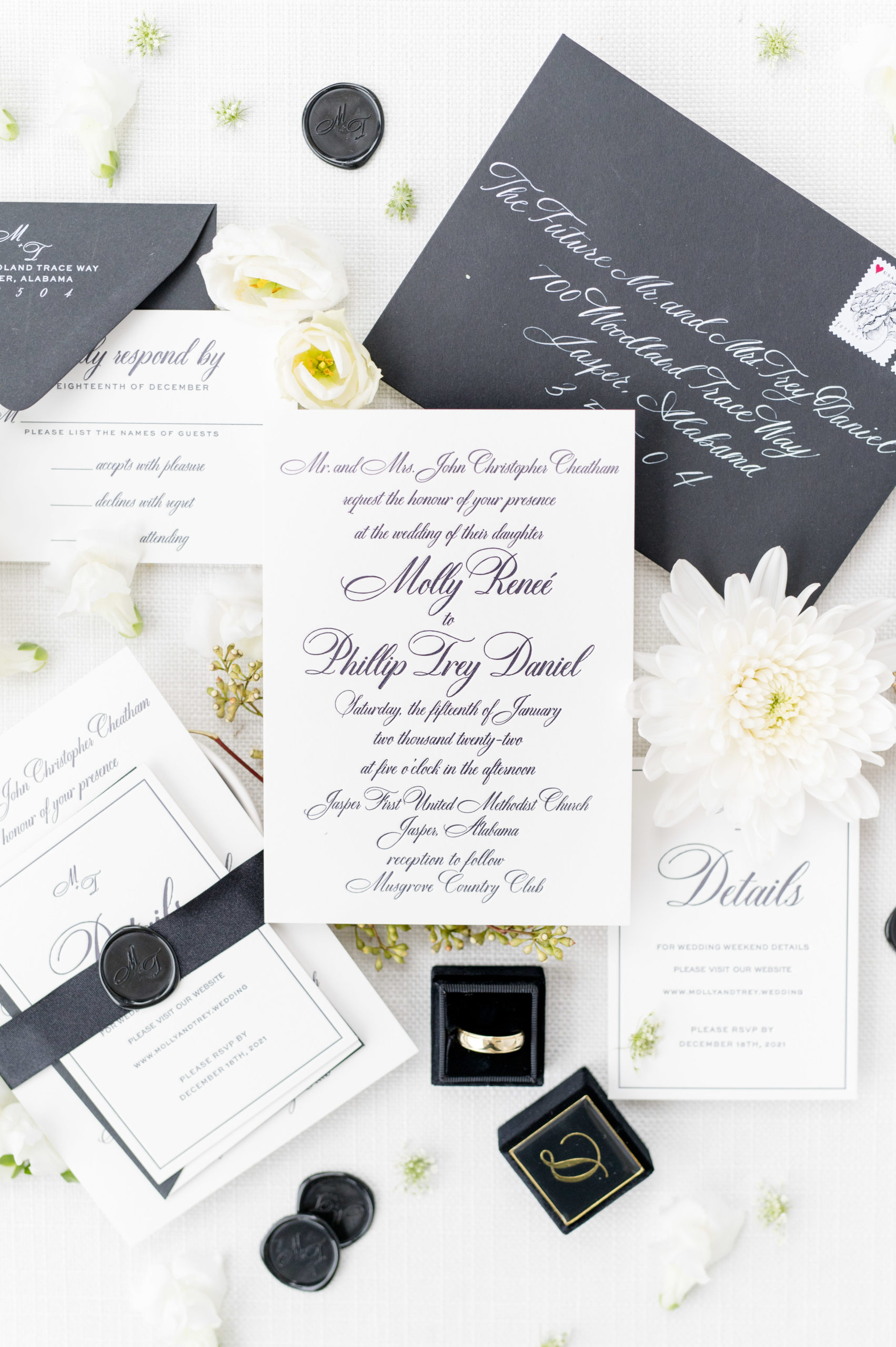 White and black wedding invitation suite.