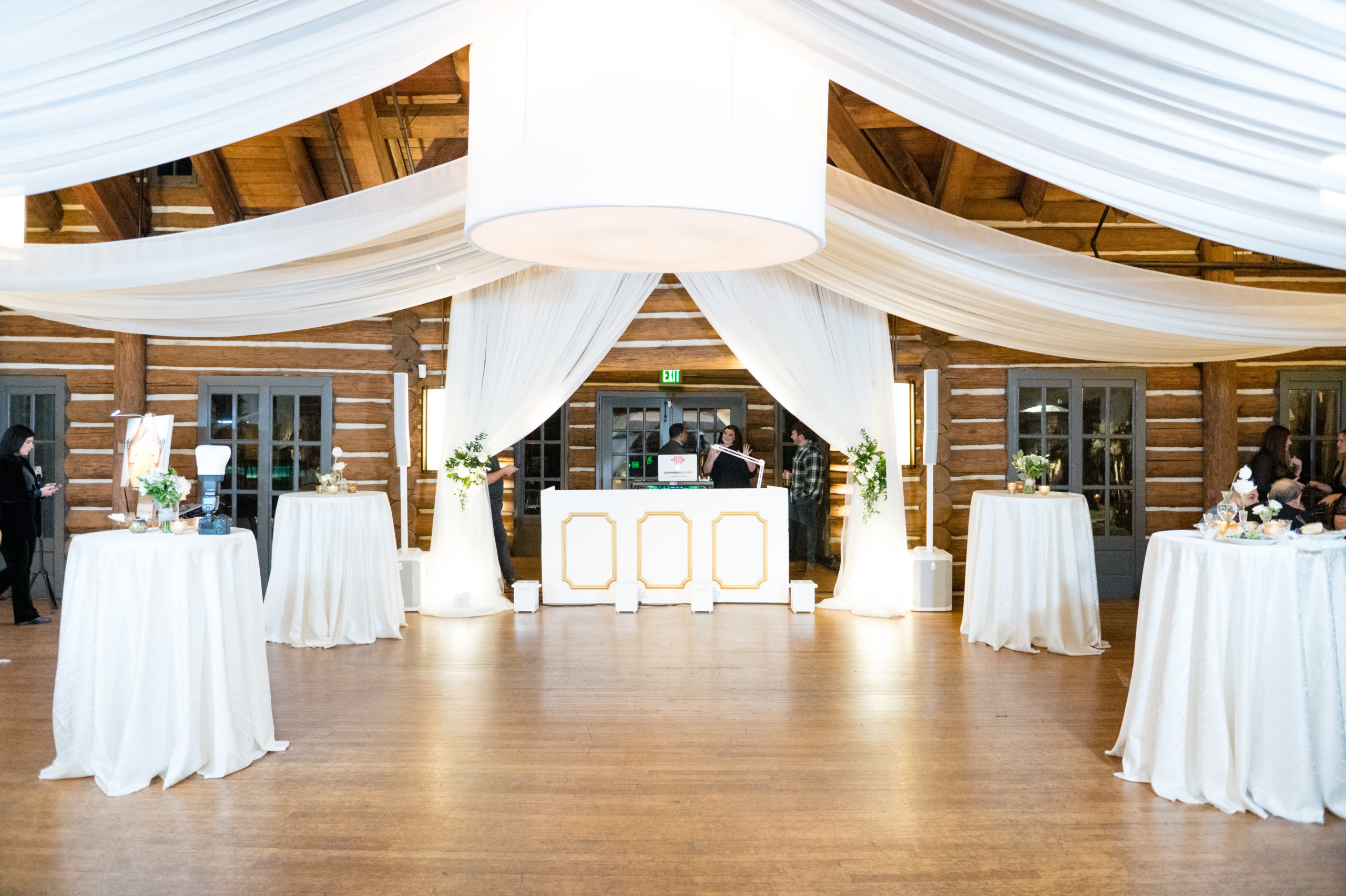 White draping fills reception space.