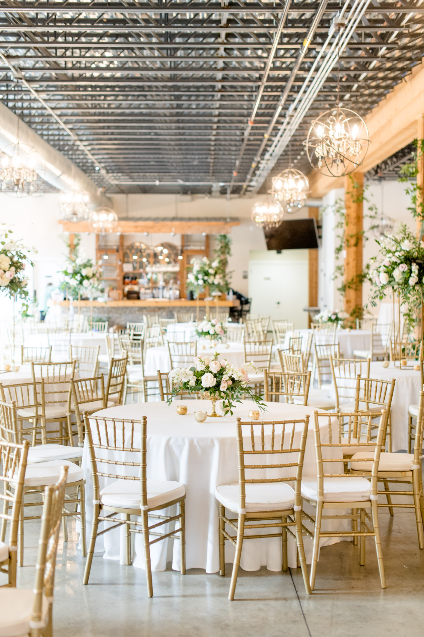 Gold, pink, and white wedding reception.