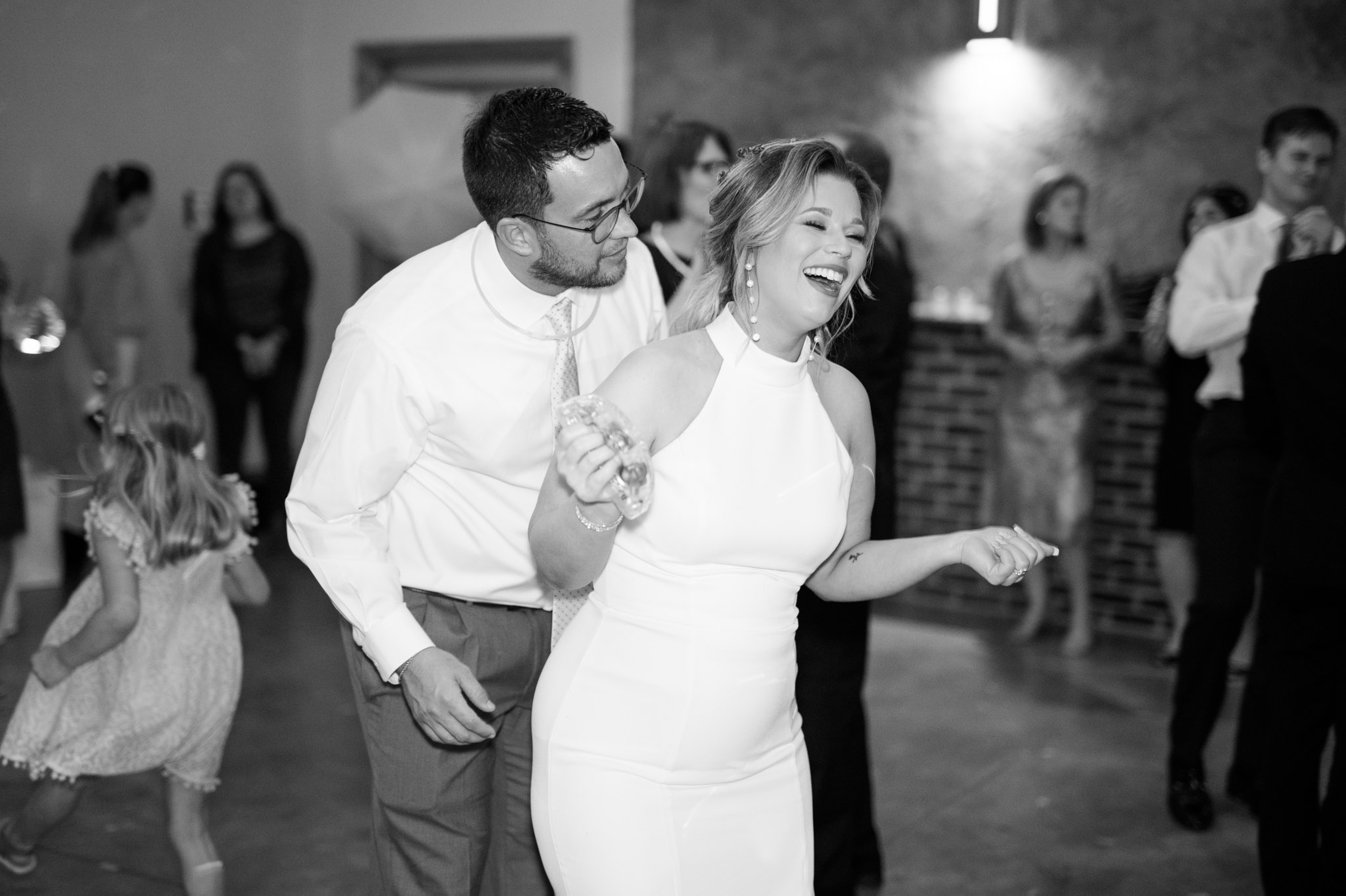 Bridesmaid dances at wedding reception.